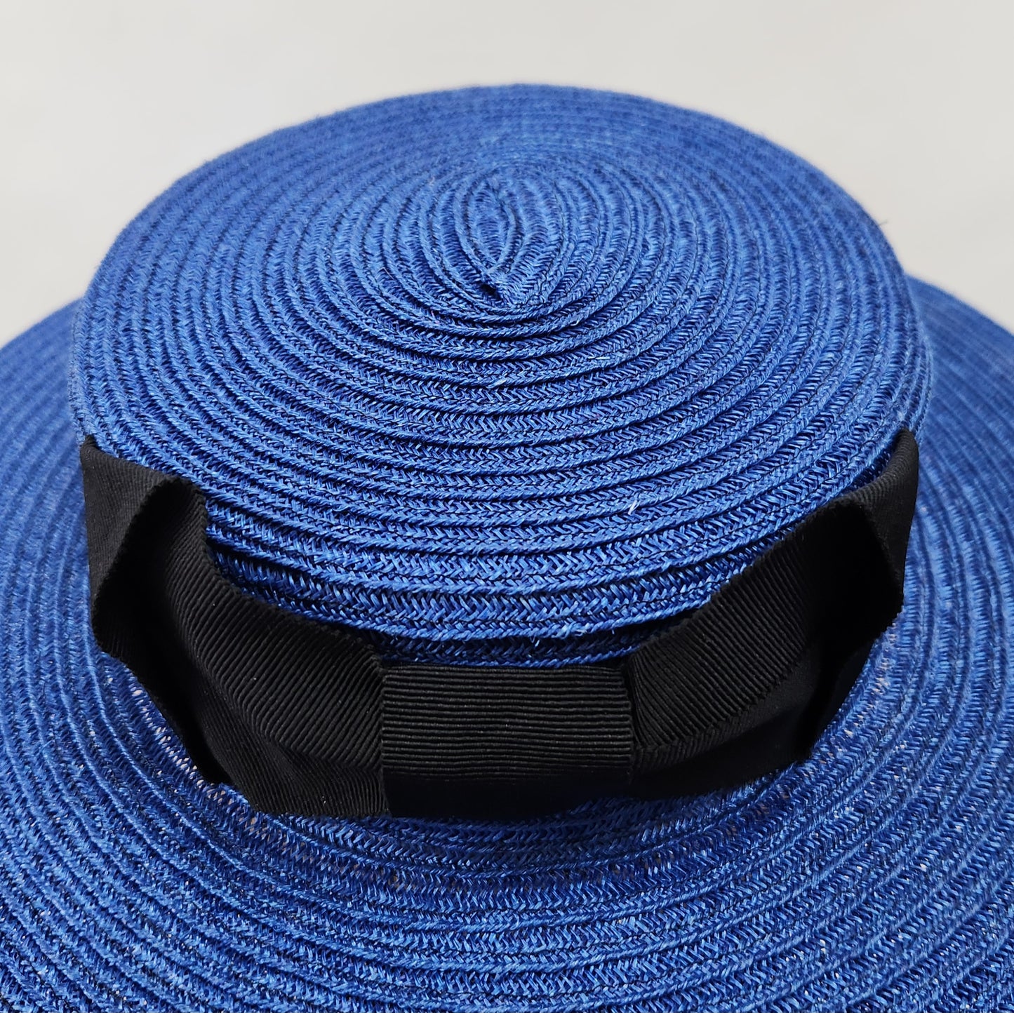 Colette Boater Hat in Blue Stitched Braid with black petersham infinity bow