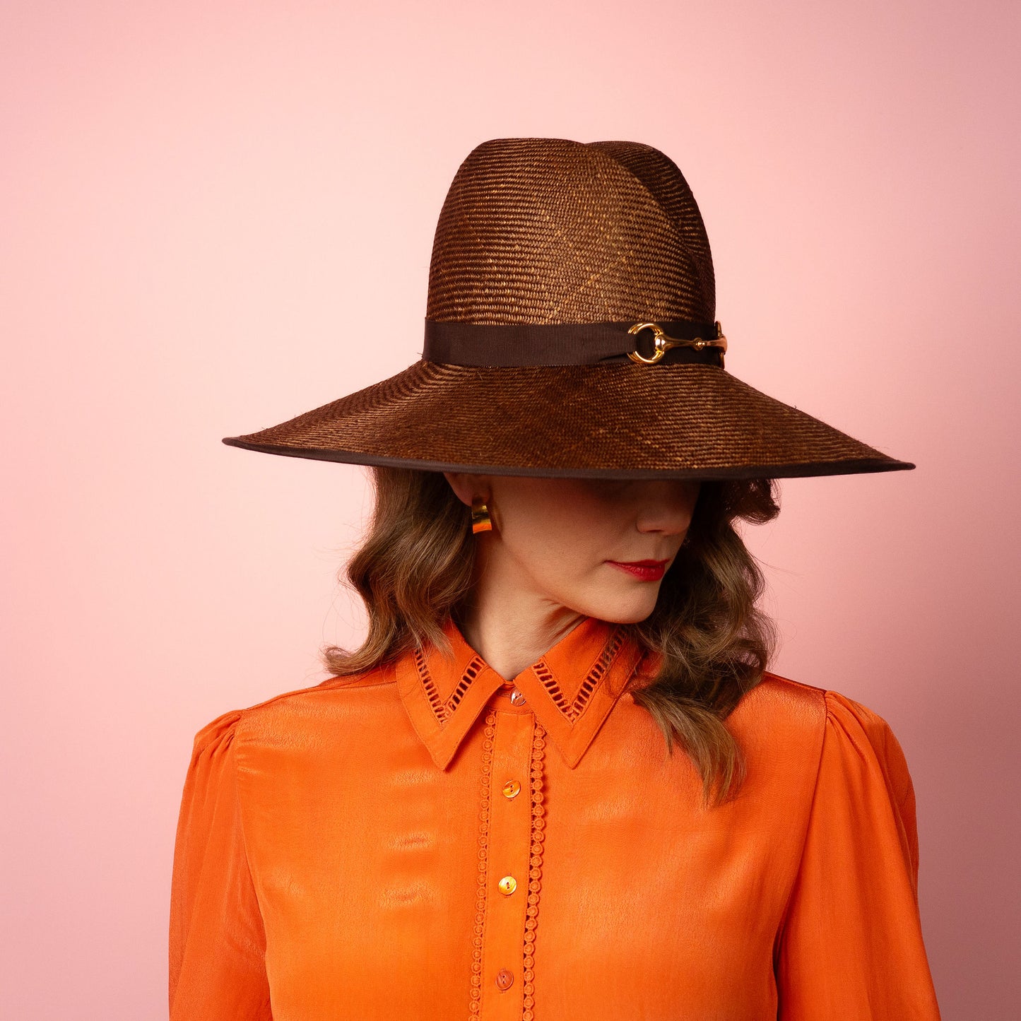 Charlotte wide Brimmed hat with shaped crown in chocolate brown straw and gold buckle brim Spring Racewear Hat