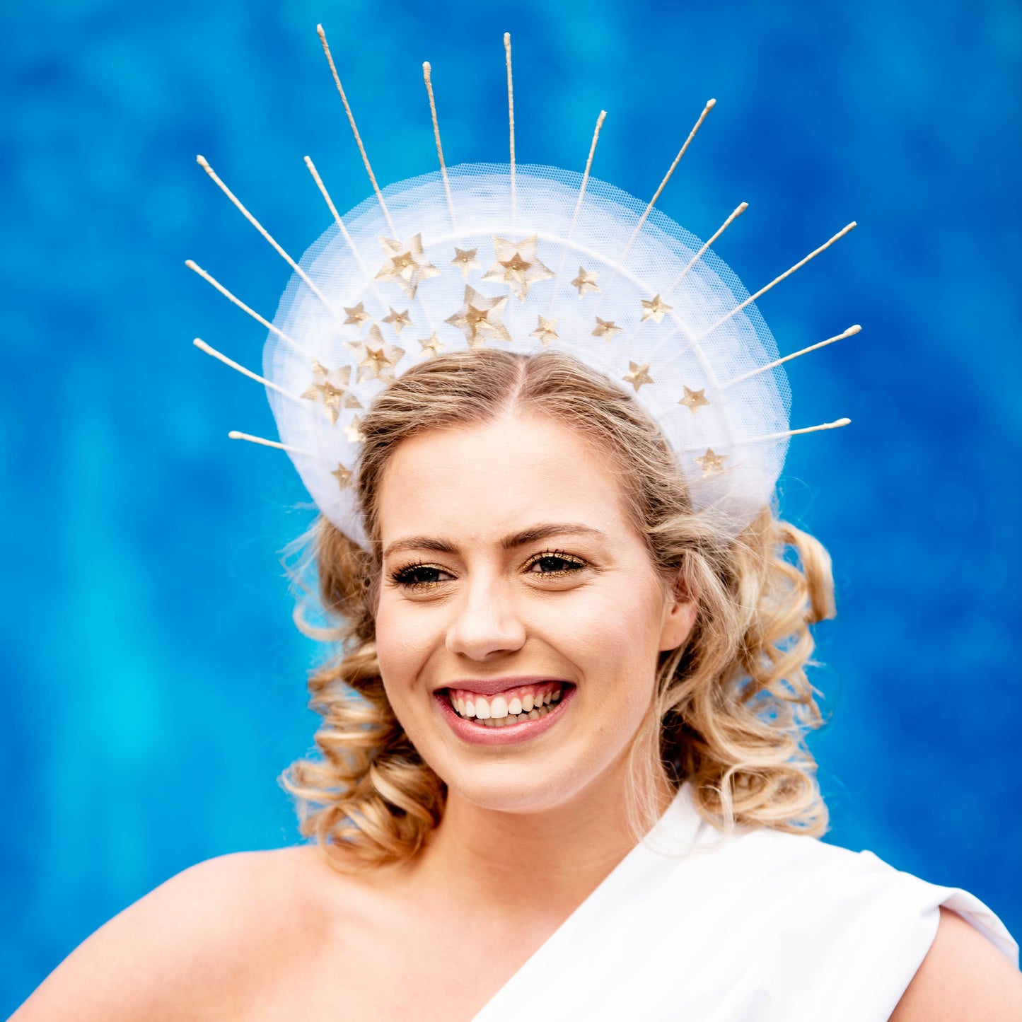 Asteria white and gold halo headpiece with star features
