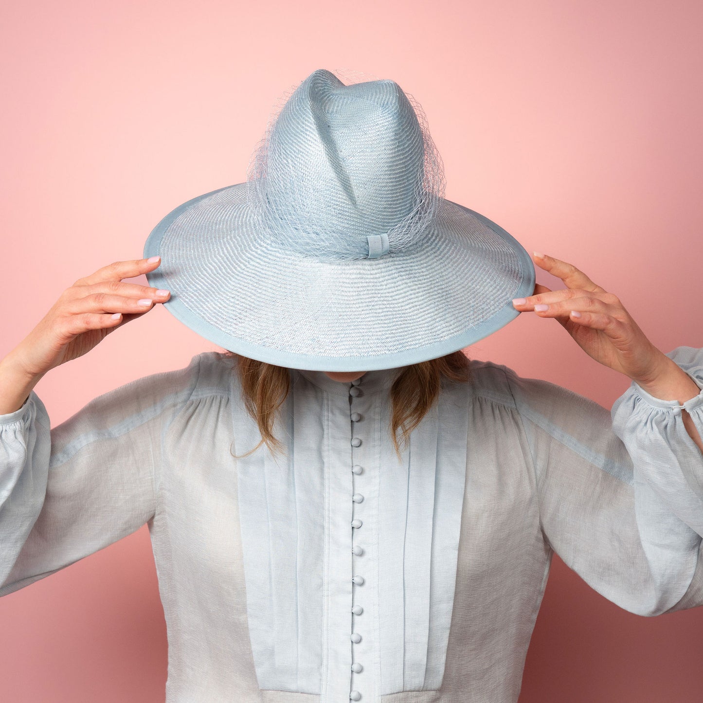 Isabella wide Brimmed hat with shaped crown in pale blue with veiling Spring Racewear Hat