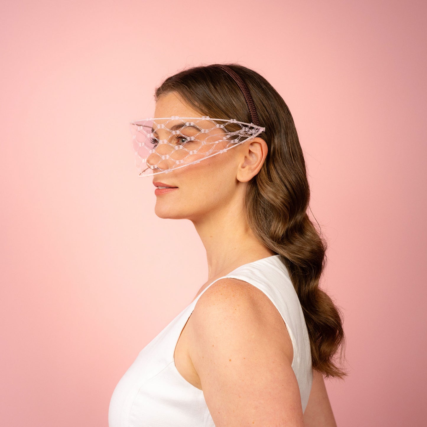 Jessica face veil on headband in pale pink Spring Racewear Headpiece