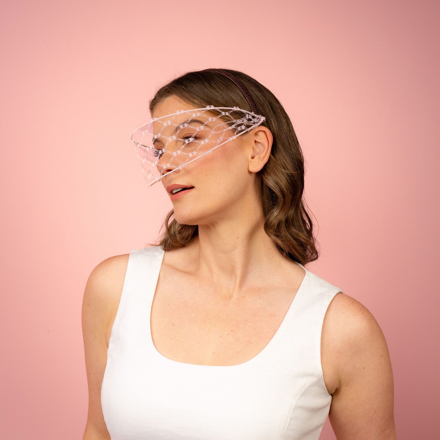 Jessica face veil on headband in pale pink Spring Racewear Headpiece