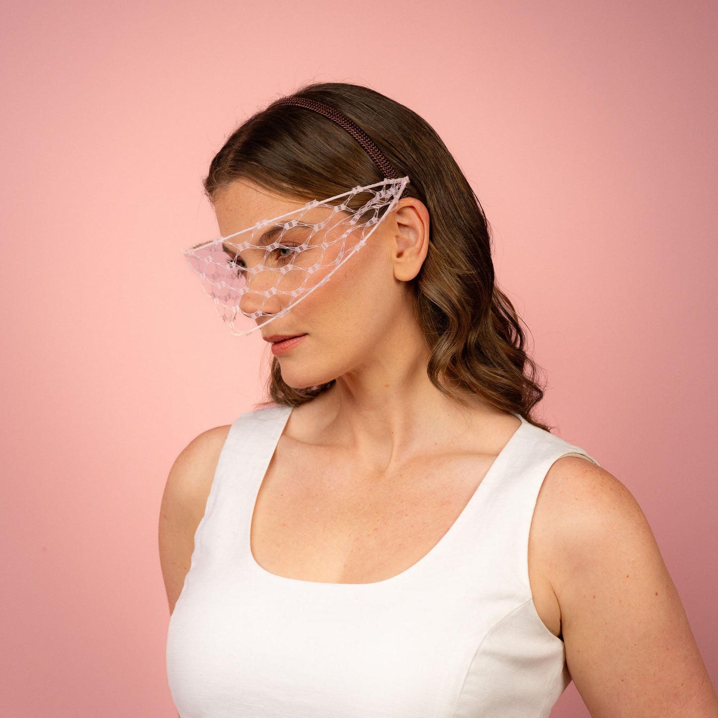 Jessica face veil on headband in pale pink Spring Racewear Headpiece