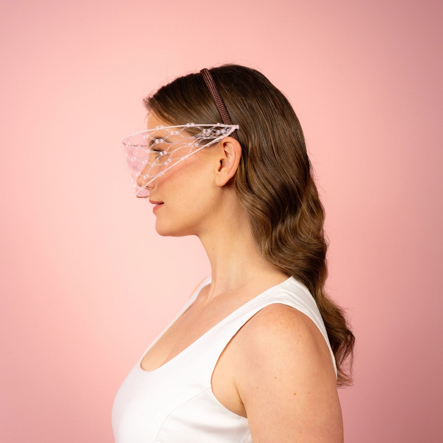 Jessica face veil on headband in pale pink Spring Racewear Headpiece