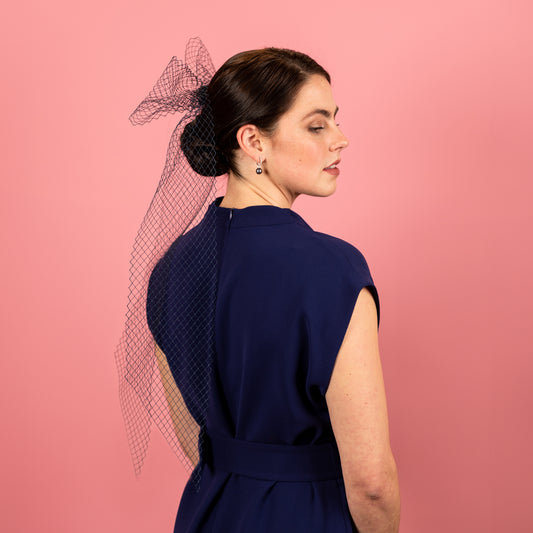 Kat Vintage Veiling bow on a comb in Navy