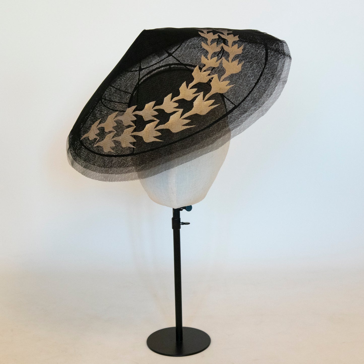 Tesselation in Flight Black Tulle Pitch Shape with Gold Bird Shape