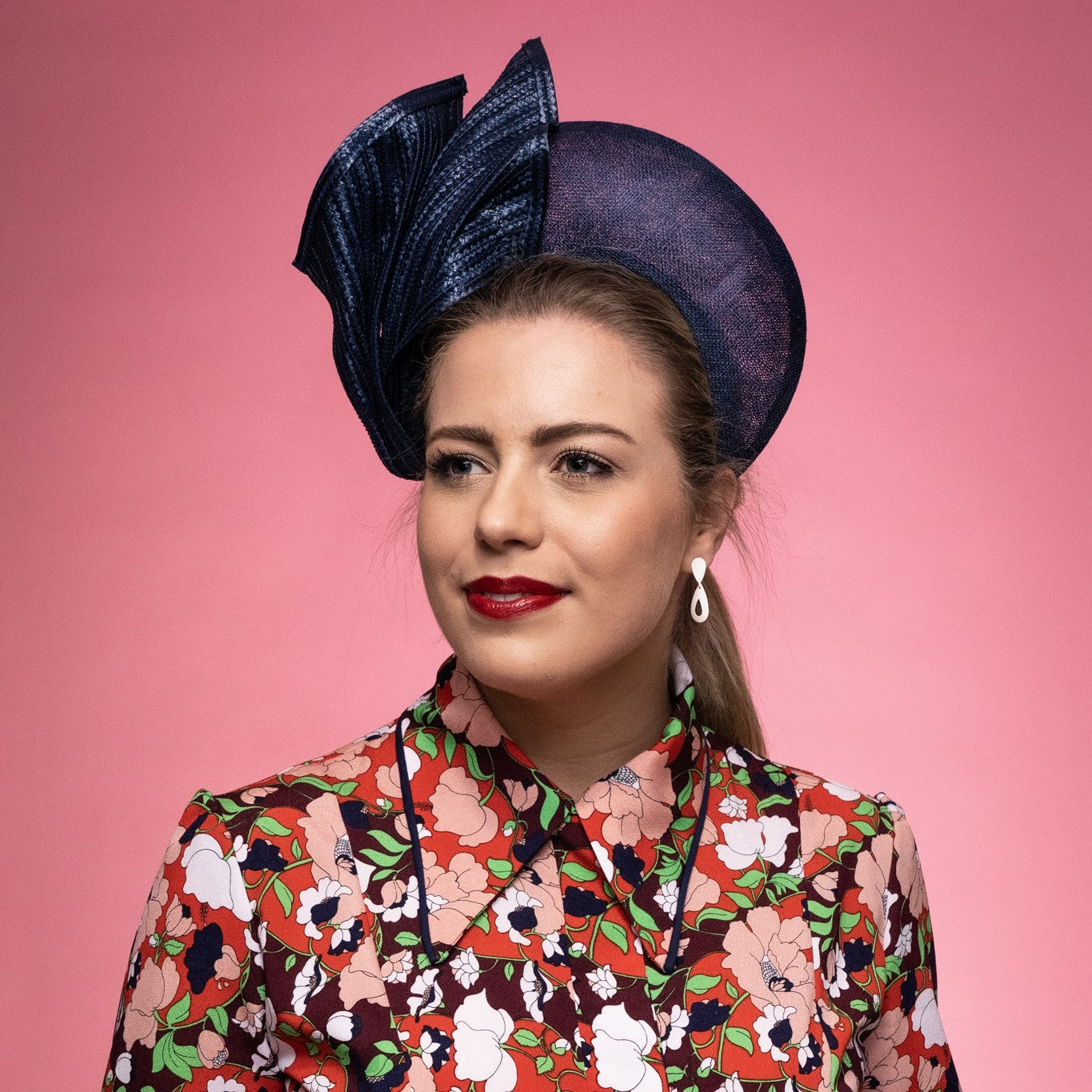 Chesney Halo with sinamay base and straw braid drapped knot trim