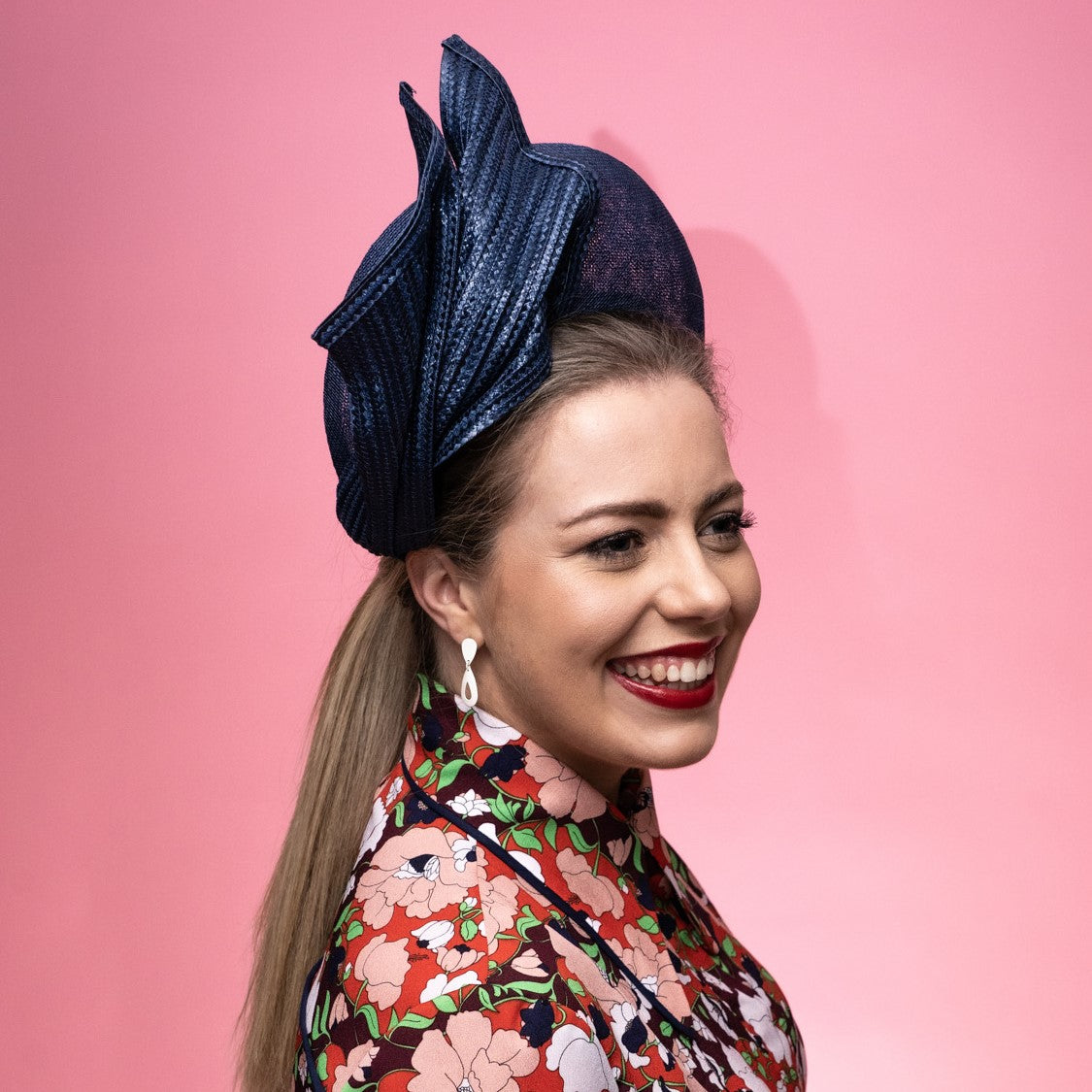 Chesney Halo with sinamay base and straw braid drapped knot trim