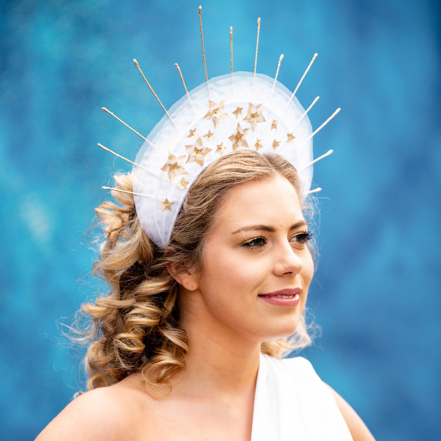 Asteria white and gold halo headpiece with star features
