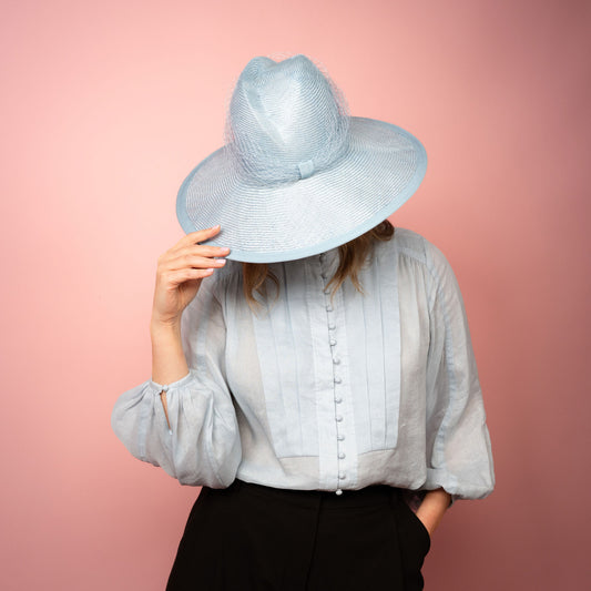 Isabella wide Brimmed hat with shaped crown in pale blue with veiling Spring Racewear Hat