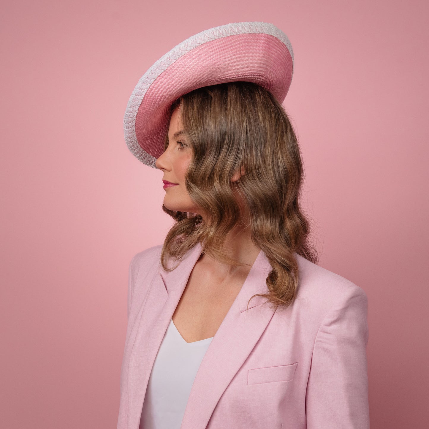 Madeline Saucer in pink straw with white edge Spring Racewear Headpiece