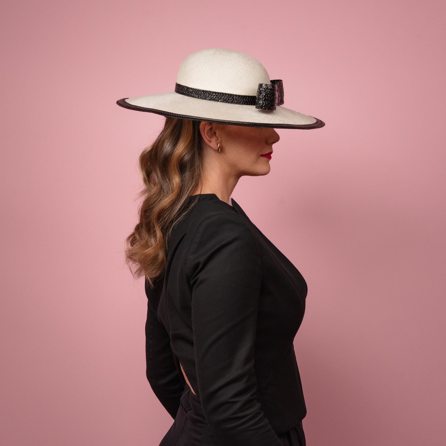 Moloney Downturned Dior Brim Hat with Round Crown in Cream Straw with black patent bow and edge Spring Racewear Headpiece