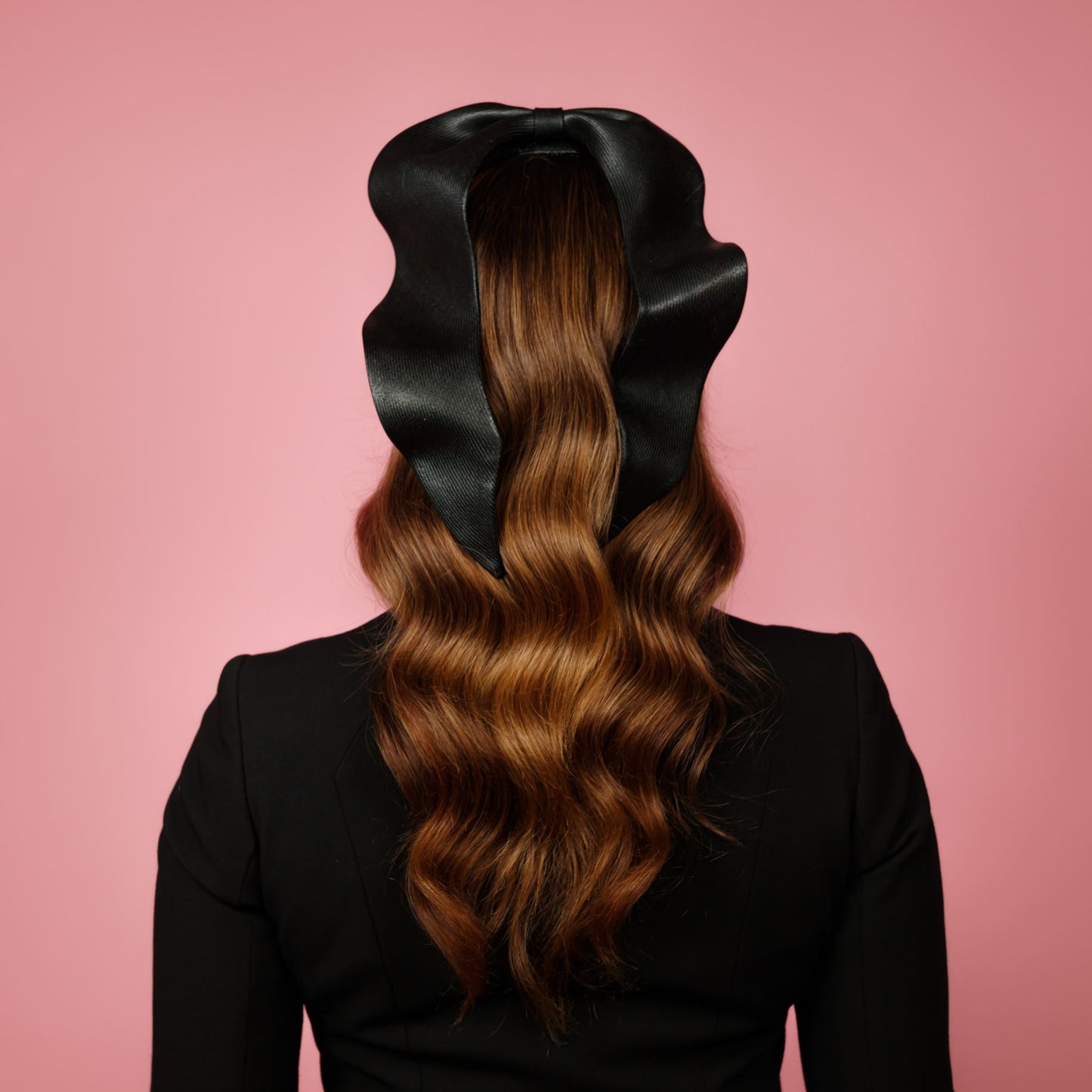 Zenith percher shaped straw headpiece with sculpted tails in black