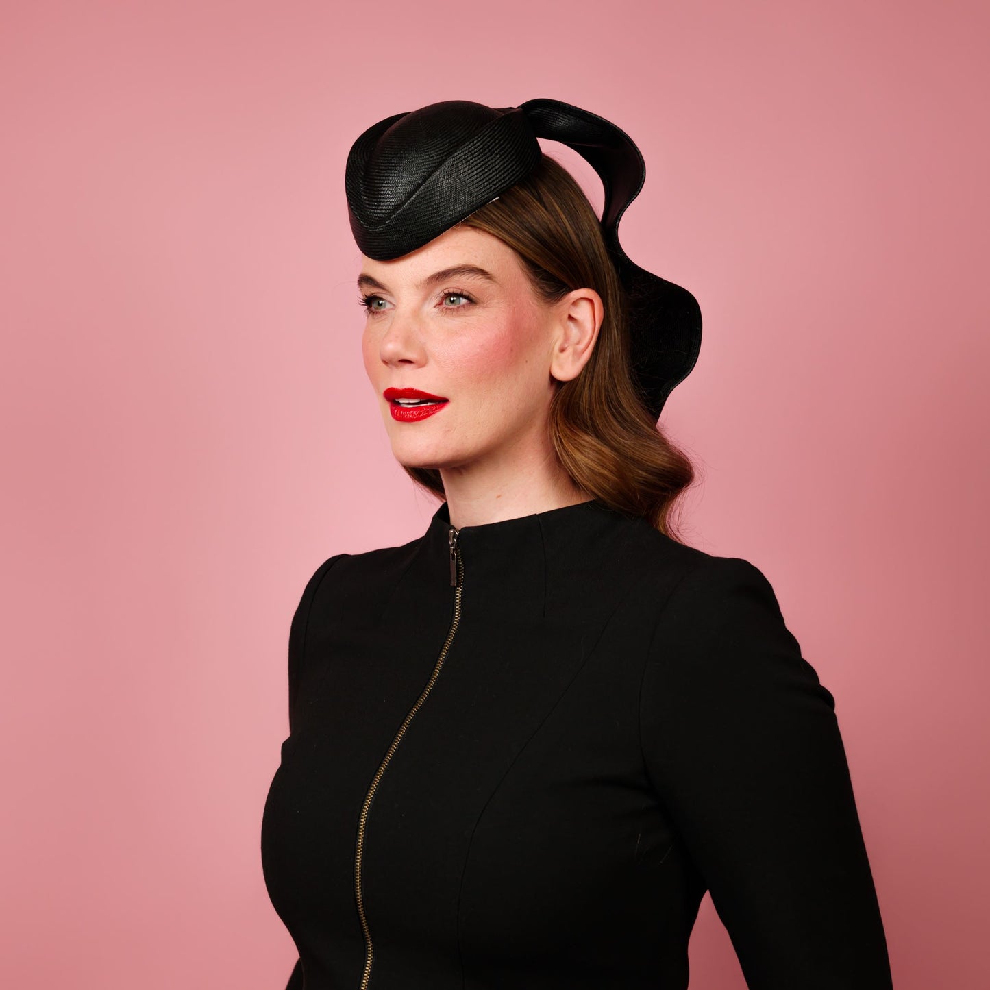 Zenith percher shaped straw headpiece with sculpted tails in black